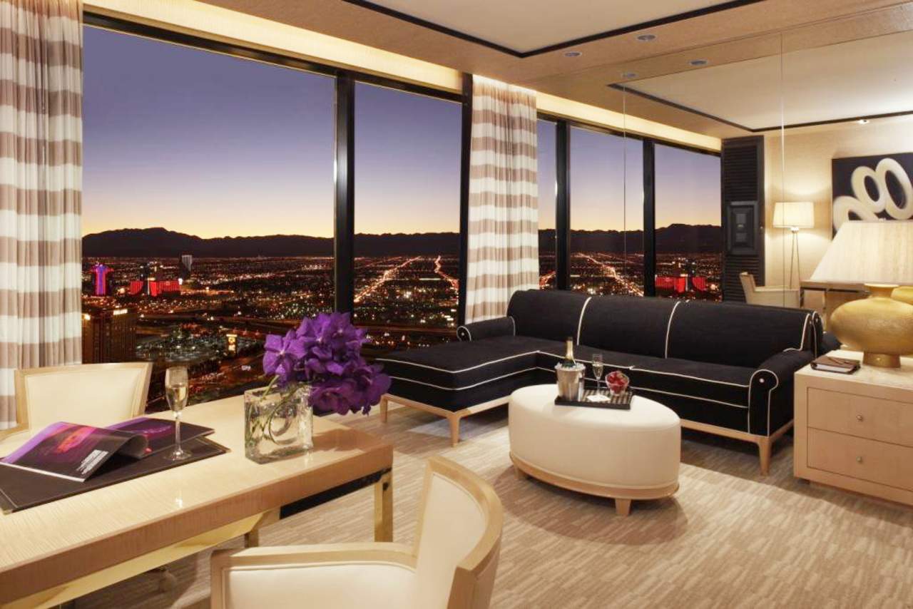 Las Vegas Hotels Under a constellation of dazzling lights, the Strip throngs with glamorous folk and star-struck visitors. The Eiffel Tower is illuminated against the night sky, boats punt along Venetian canals, and the roulette tables heat up with anticipation.
