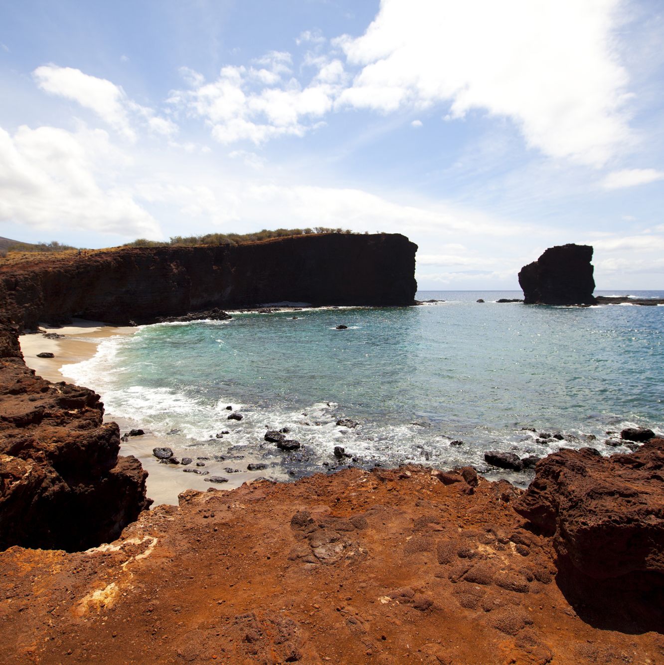 Hikers with Puu Pehe in the distance