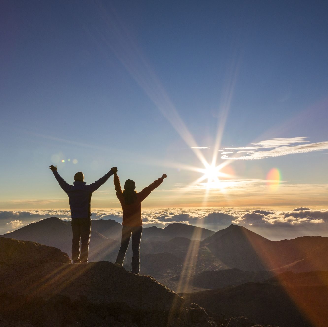 Couple enjoy the morning sun on Haleakala