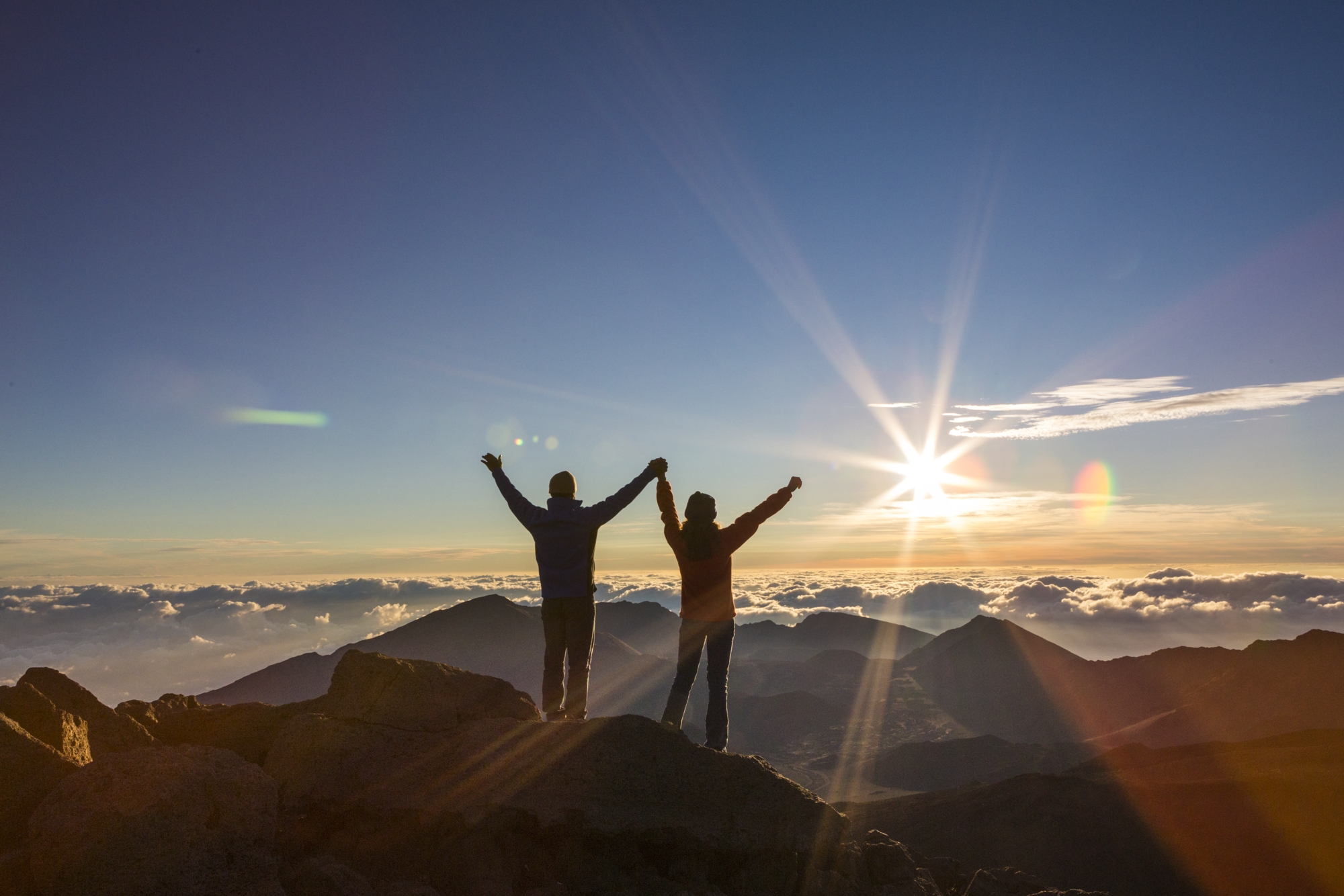 Couple enjoy the morning sun on Haleakala