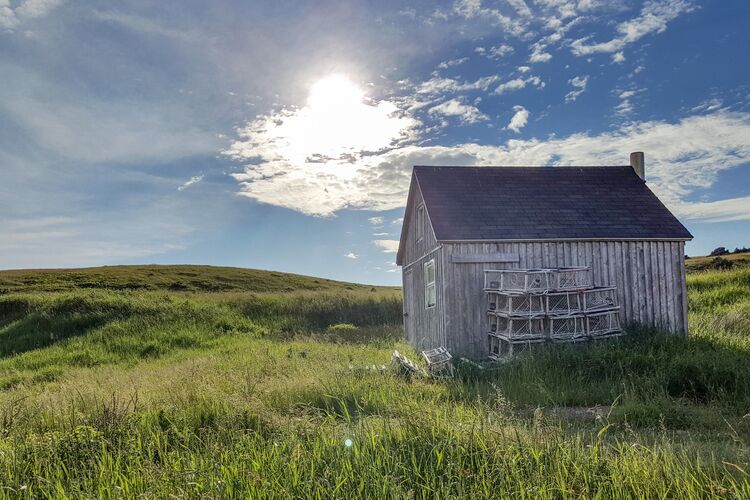 Ein kleines Fischerhaus nahe Cheticamp auf der Cape Breton Island