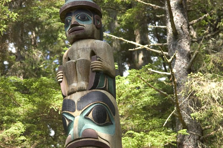 Totems in the Sitka National Historical Park in Sitka, Alaska. Trails wander through the park past a dozen restored totems.