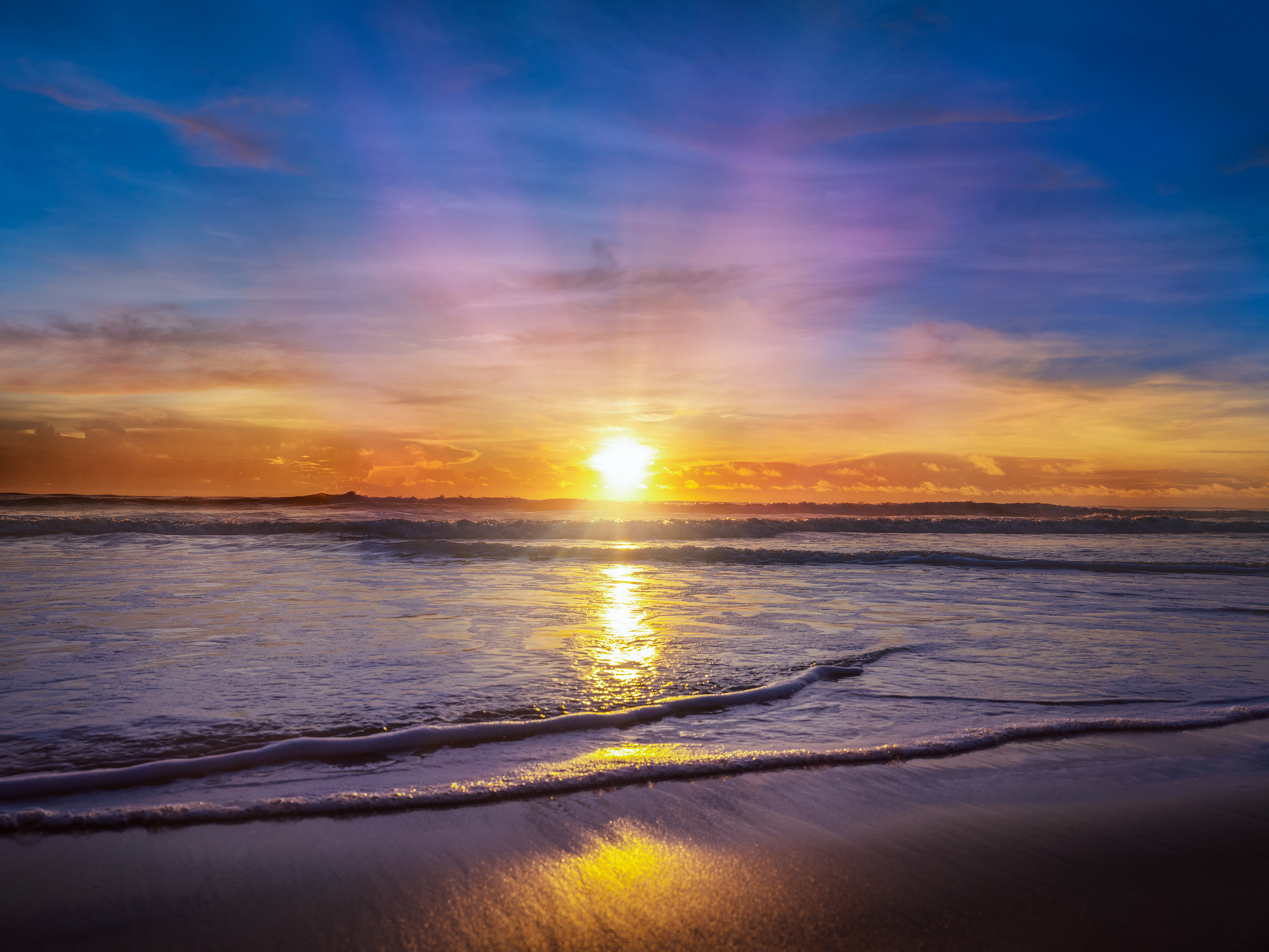 Farbenfroher und imposanter Sonnenaufgang am Daytona Beach