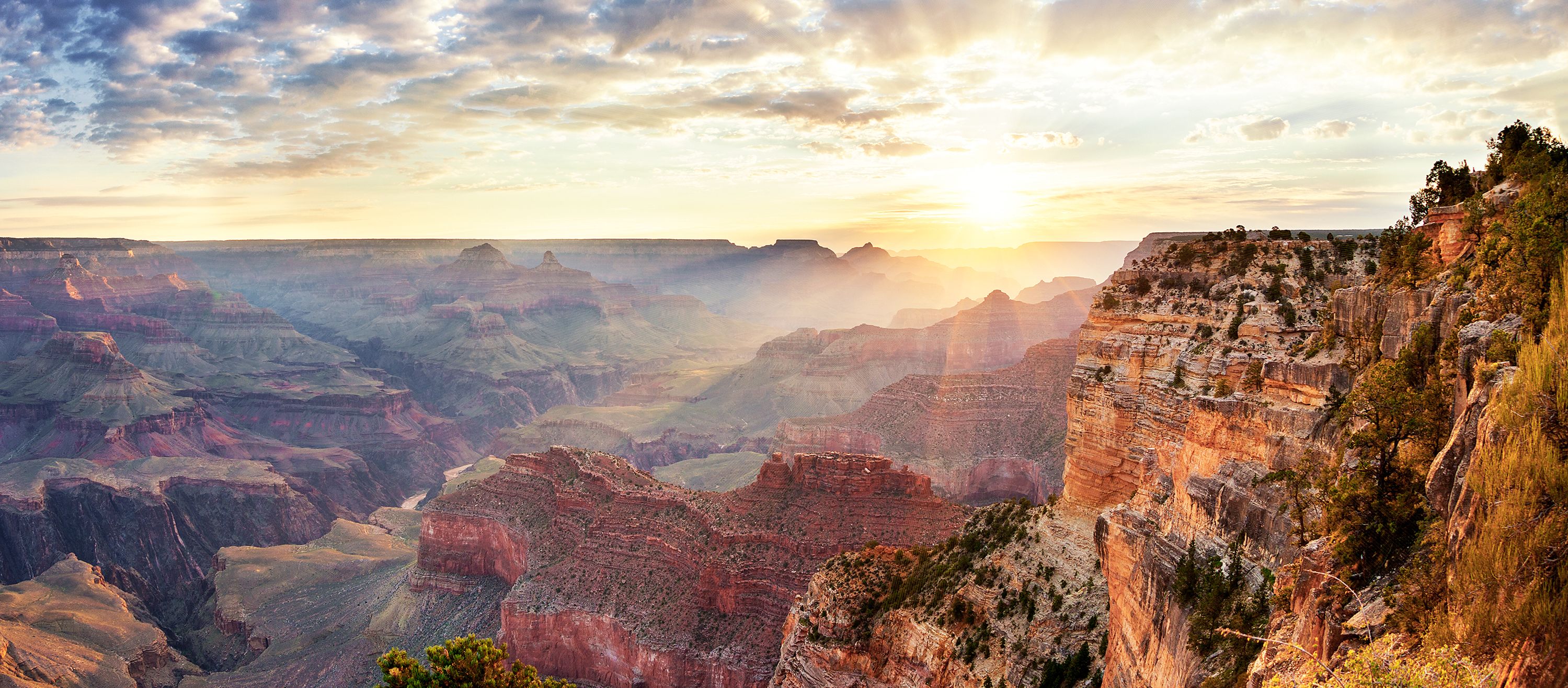Der Sonnenaufgang über den Schluchten des Grand Canyon