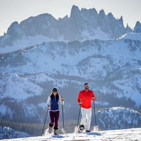 A couple snowshoeing at Minaret Vista, Mammoth Mountain, California