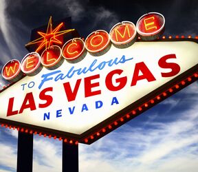 Das Schild heißt Besucher willkommen