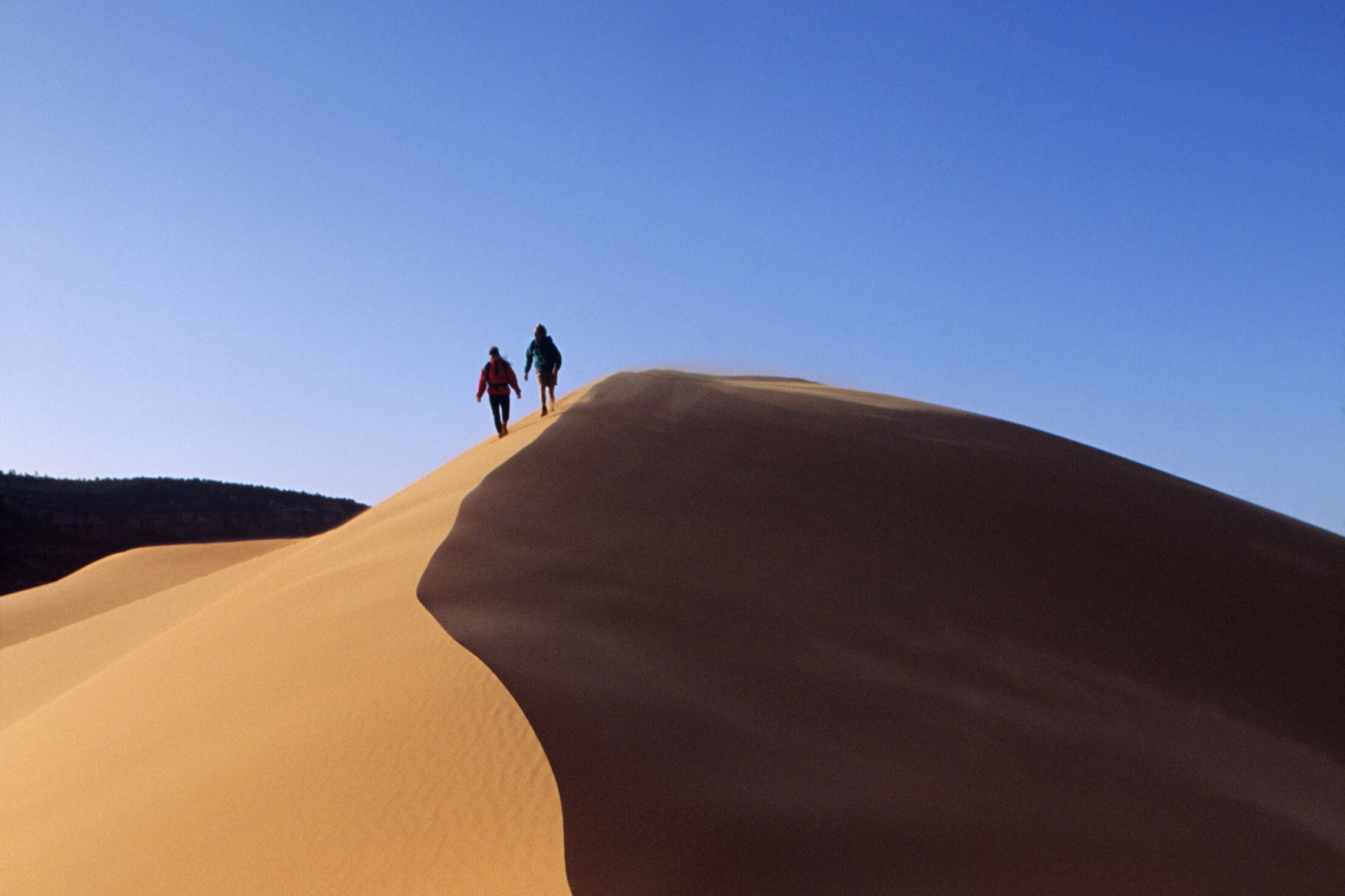 Couple Walking on Coral Pink Sand Dunes, Kanab