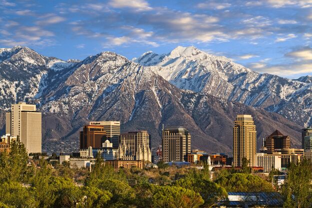 Skyline of downtown Salt Lake City with the Towering Wasatch Mountain range in the background Skyline of downtown Salt Lake City with the Towering Wasatch Mountain range in the background